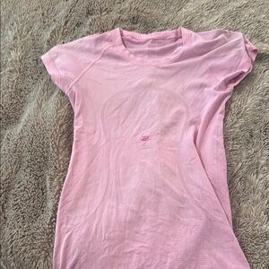 Lululemon Pink Swiftly Tech Size 4 RIP IN MIDDLE